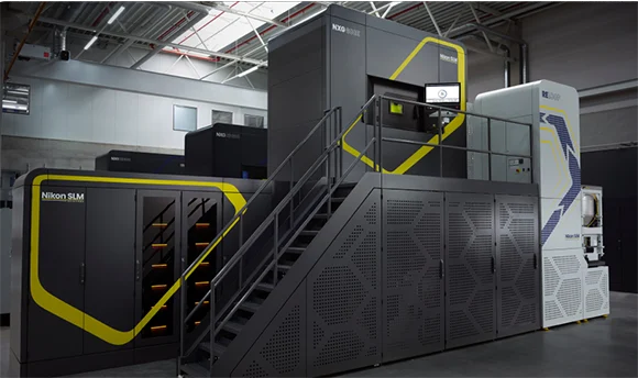 Row of industrial metal additive manufacturing systems